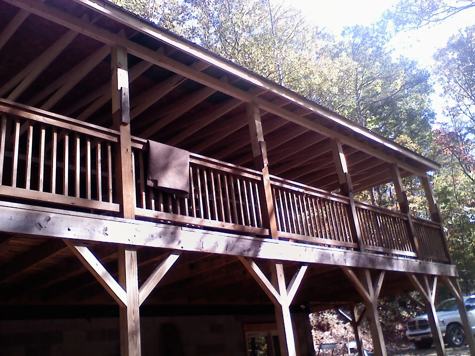 Timber framing under a new elevated porch and deck — Roof Leak Repair in Pocasset by Roofing Brothers
